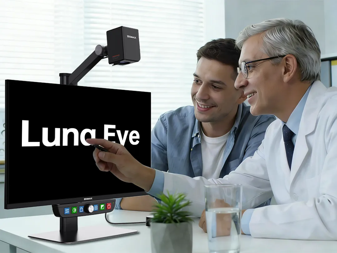 Optometrist for vision loss demonstrating a desktop magnifier