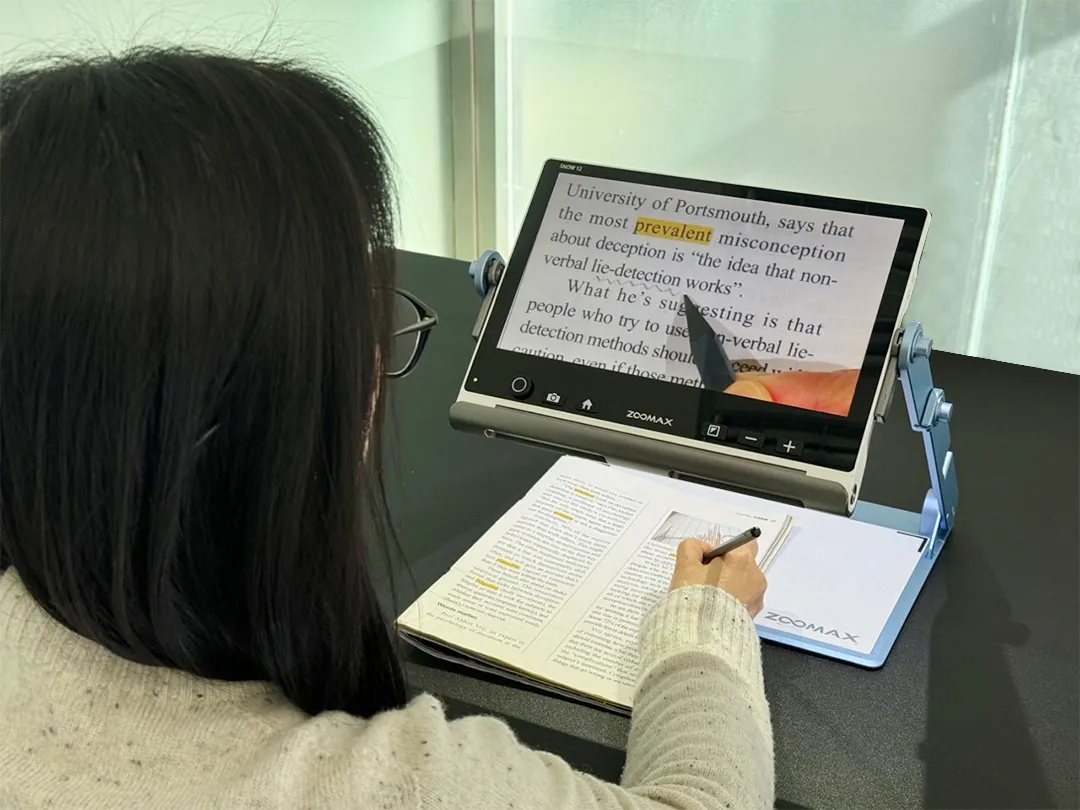 low vision aids for macular degeneration - Zoomax Snow 12 supporting writing tasks for AMD patients